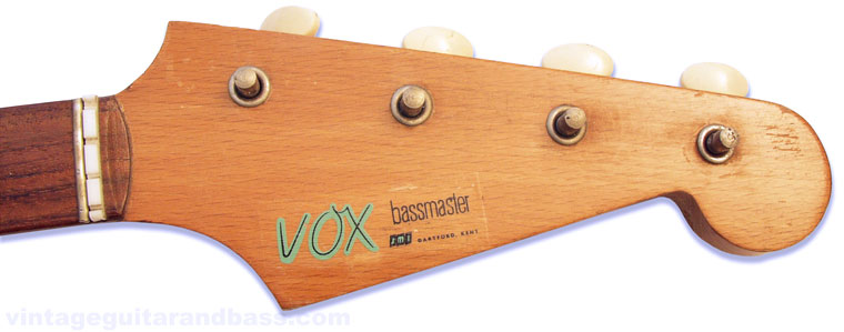 Headstock with decals, Vox logo and Bassmaster designation
