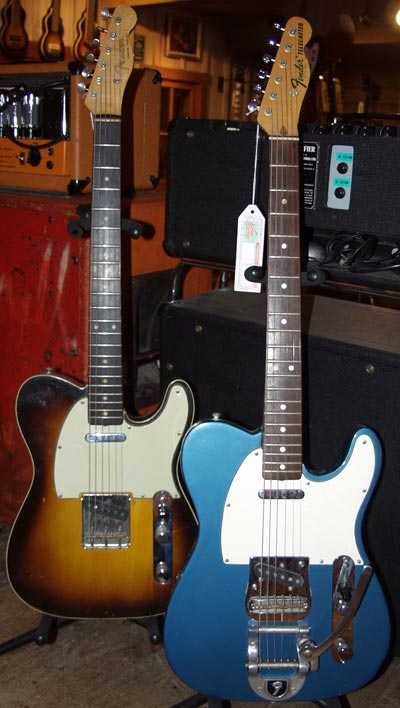 Two Fender Telecasters: left- Sunburst 1960 Fender Telecaster Custom, right- Lake Placid Blue Telecaster, early 1970s