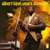 The cover of Albert Kings Years gone by shows him playing his 1959 Gibson Flying V upside down. Kings guitars were not restrung for left handed play - merely turned over!